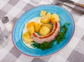 Fried sausages with potato and eggs Royalty Free Stock Photo