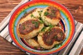 Fried savory fish patties with green