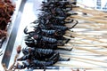 Fried scorpions on skewers placed on the stall for sale Royalty Free Stock Photo