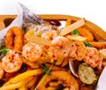 fried seafood plate on wooden tray Royalty Free Stock Photo