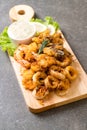 fried seafood (squids, shrimps, mussels) with sauce