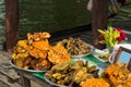 Fried seafood and street food, Burmese cuisine, sold on U-Bein bridge, near Mandalay, Myanmar.