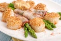 Fried seared scallops breaded with sesame.