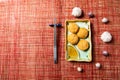 Fried shellfish balls. Chinese Traditional cuisine concept. Dumplings Dim Sum in bamboo steamer with text copy space. Asian food Royalty Free Stock Photo