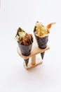 Fried Shirauo and Tempura California or Temaki Sushi Hand Roll on Wood Stand Royalty Free Stock Photo