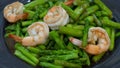 Fried Shrimp Asparagus in black plate