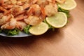 Fried Shrimp in batter on plates with lemon Royalty Free Stock Photo