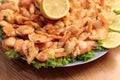 Fried Shrimp in batter on plates with lemon Royalty Free Stock Photo