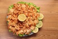 Fried Shrimp in batter on plates with lemon top view Royalty Free Stock Photo