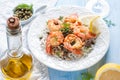 Fried shrimp with capers, herbs and wild rice