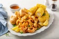 Fried shrimp and corn on the cob Royalty Free Stock Photo