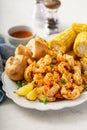 Fried shrimp and corn on the cob Royalty Free Stock Photo