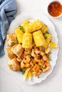 Fried shrimp and corn on the cob Royalty Free Stock Photo