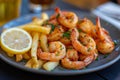 Fried shrimp and french fries plate garnished Royalty Free Stock Photo