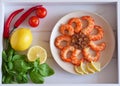 Shrimp fried on a plate and fresh vegetables, fruit on a beautiful tray Royalty Free Stock Photo