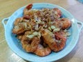 Fried shrimp with garlic and pepper, fresh seafood, sweet taste of shrimp meat, onion, garlic and pepper