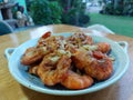 Fried shrimp with garlic and pepper, fresh seafood, sweet taste of shrimp meat, onion, garlic and pepper