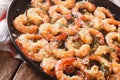 Fried shrimp in garlic sauce with parmesan and herbs closeup. Ho Royalty Free Stock Photo