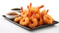 Fried shrimp on a platter with hot sauce on white background. Generative AI