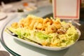 Fried shrimp salad on chinese style table