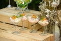 Fried Shrimp salad in a cocktail glass. Shrimp ceviche served in cocktails. Shrimp Cocktail served with glass and salad sauce on a Royalty Free Stock Photo