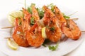 Fried shrimp skewer with lemon Royalty Free Stock Photo