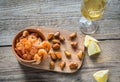 Fried shrimps and mussels with glass of white wine Royalty Free Stock Photo