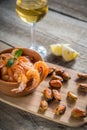 Fried shrimps and mussels with glass of white wine Royalty Free Stock Photo