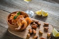 Fried shrimps and mussels with glass of white wine Royalty Free Stock Photo