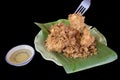 Fried shrimps or prawns with sauce on banana leaf ceramic plate Royalty Free Stock Photo