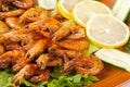 Fried Shrimps with Salad Leaves, Lemon Royalty Free Stock Photo