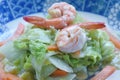 fried slice cabbage and carrot with shrimp in soy sauce on plate