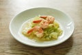 fried slice cabbage with shrimp in soy sauce on plate