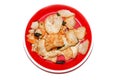 Fried slice tapioca, Tapioca chips in the plate on the top of white background. A popular deep fried snacks