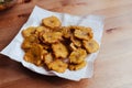 Fried slices of ripe plantains chips , traditional and popular snack and side dish in Central America and South America, Royalty Free Stock Photo