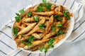 Fried smelt. Delicious small fish with fresh parsley