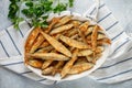 Fried smelt . Delicious small fish in a white plate