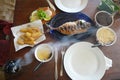 Fried snapper fish as it is served in Bahia do Porcos Restaurant, Fernando Noronha, Brazil Royalty Free Stock Photo