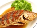 Fried snapper with fish sauce on the dish