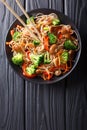 Fried soba noodles with mushrooms, broccoli, carrots, peppers cl
