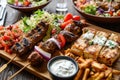 Fried souvlaki, greek salad and tzatziki on wooden table