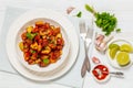 fried spanish potatoes with paprika sauce in bowl