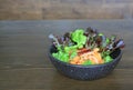 Fried spicy salmon salad mixed vegetable and herb Royalty Free Stock Photo