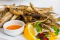 Fried sprat with souce Royalty Free Stock Photo