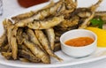 Fried sprat with souce Royalty Free Stock Photo