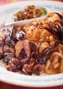 Fried squid with italian pasta Royalty Free Stock Photo