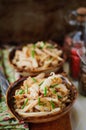 Fried Squid with Onions and Chives, vintage effect, copy space for your text Royalty Free Stock Photo