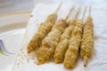 Fried squid skewers