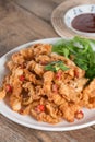 Fried squid sliced on white plate. Royalty Free Stock Photo