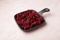 Fried or stewed beetroot in cast-iron pan, close-up, copy space Royalty Free Stock Photo